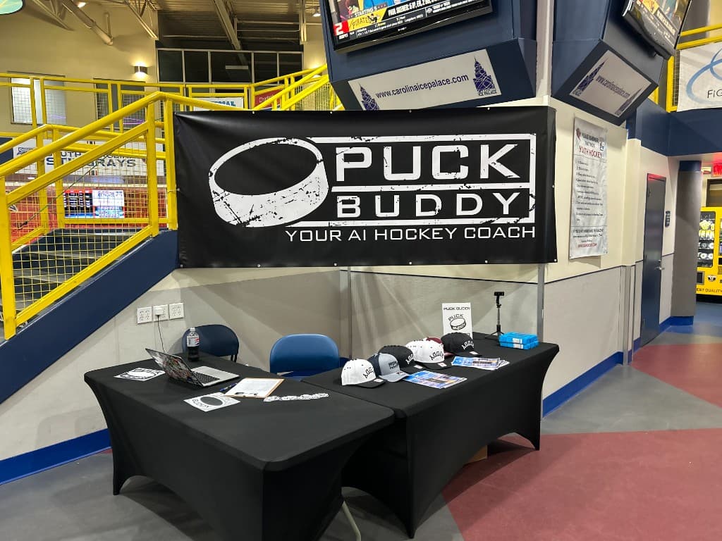 Puck Buddy booth at a hockey clinic.